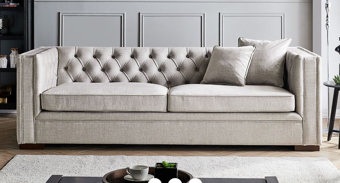 Button-back detail on Luxe slate grey sofa