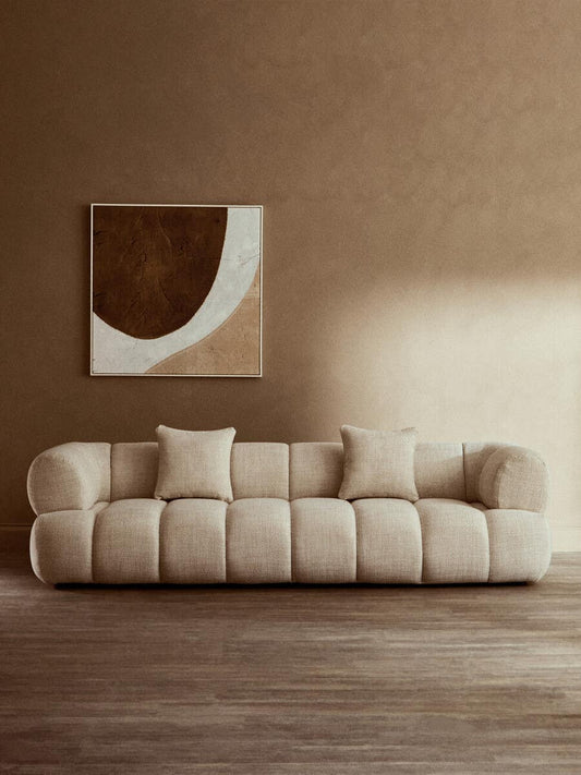 Monroe cream curved sofa with quilted linen upholstery