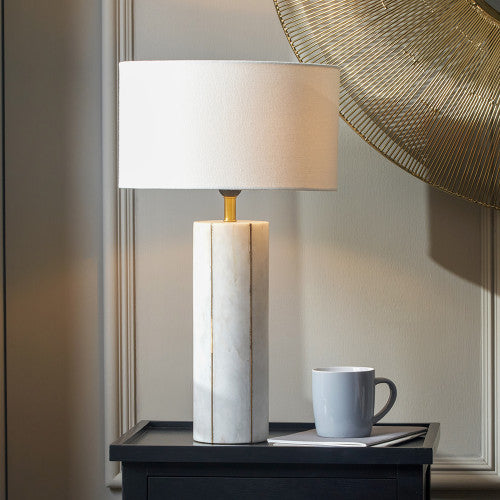 White marble table lamp with brass inlay and white cotton shade